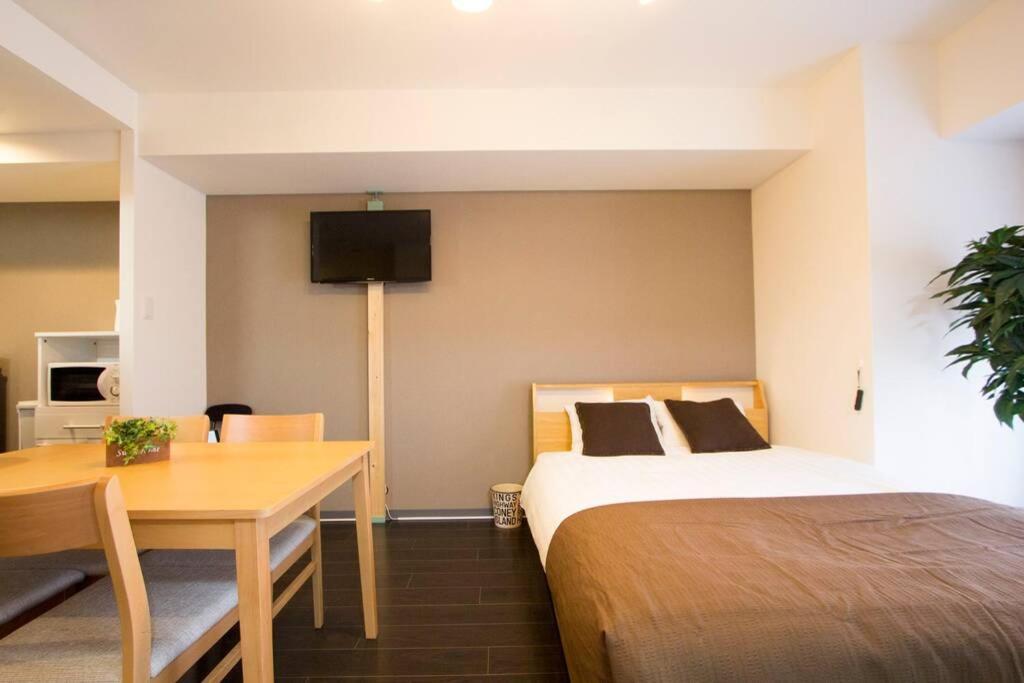 ようこそ札幌へ! 大通公園まで地下鉄10分 定員6名 Firetv完備 1階はセコマ Appartement Buitenkant foto